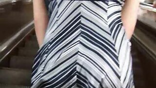 UT_719#What a cool brunette in a striped dress! The wind helped me, so I easily shot her pos