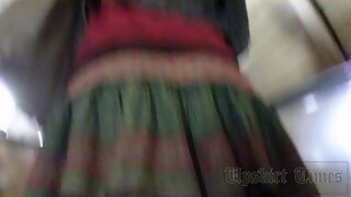 UT_2381#Cutie in colored skirt goes up on escalator. Our operator stood behind of her and put