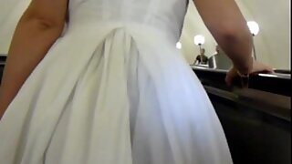 UT_1571#Brunette in a loose white dress. I've managed to make voyeur upskirt shots of all her