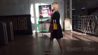 Ut_5761# Under the skirt of a girl in a short black dress. Our cameraman held her skirt up for