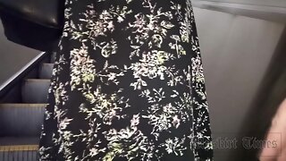 UT_4494#Under the skirt of a blonde in a long green dress. Our cameraman kept her skirt up fo