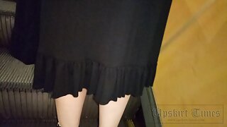 UT_3833#Upskirt woman in a long white skirt. Our operator managed to put her hand under her s