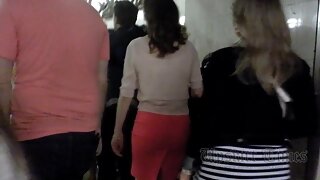 UT_2697#This girl in narrow red dress attracted attention from the crowd. Our operator put hi