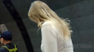 UT_3978#In this video, a blonde in a long red skirt. Under the skirt, red panties, stockings 