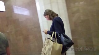 Ut_5955# A girl in a long beige skirt is upskirted. Our cameraman managed to slip his hand und