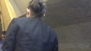 UT_2726#Brunette cutie in a dark. She was standing on an escalator without noticing anything.