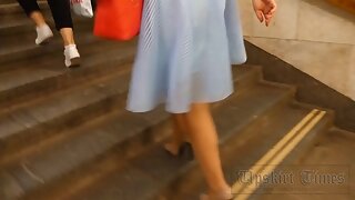 UT_3335#Blonde in a blue skirt. Our operator photographed close-up of her ass and shaved crot