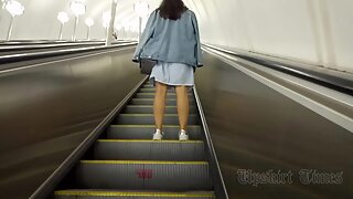 Ut_5921# A tanned girl in a short white skirt gets upskirted. Her pubic area and shaved crotch