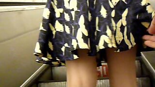 UT_881#A blond in a short dress! She had pulled her skirt down several times because of the 