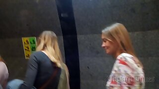 UT_3451#The girl in a bright motley dress stood out among the crowd. I took a place behind he