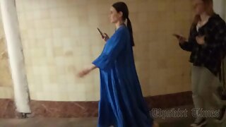 Ut_5808# Under the skirt of a pregnant girl in a long blue dress. Our cameraman held her skirt