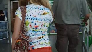 UT_1017#A girl in a large red skirt, I follower her to the escalator, she was in a rush. Her 