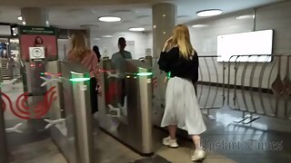 Ut_5949# A blonde in a long white skirt gets upskirted. Our cameraman lifted her skirt several