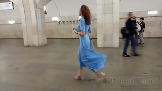 Ut_6113# A girl in a long blue dress is seen under her skirt. Our cameraman managed to slip hi