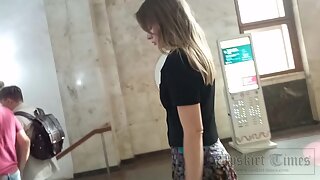 Ut_5801# Upskirt girl in a multi-colored skirt. Our cameraman brazenly lifted her skirt and ca