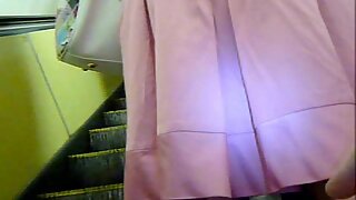 UT_1573#Girl in a loose pink skirt and stockings. It wasn't enough light on the elevator and 