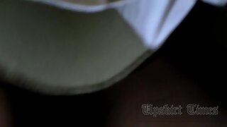 UT_2069#Girl in wide white skirt. Our cameraman took a look up of her skirt few times taping 