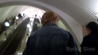 UT_3416#Girl in a wide white skirt. On the escalator in the metro you can find excellent mode
