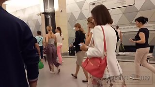 Ut_5887# Upskirt of a tanned girl in a wide multicolored skirt. Our cameraman brazenly lifted 