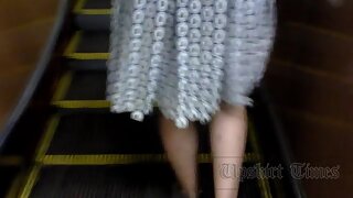 UT_2928#Blonde in a wide blue skirt. Beautiful tanned butt in red panties. Our upskirt master