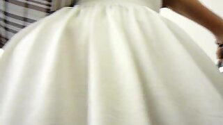 UT_1848#Tanned blondie in short white dress. I couldn't miss a chance of making girl upskirt 