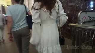 Ut_5728# Under the skirt of a girl in a short white dress. Our cameraman held her skirt up for